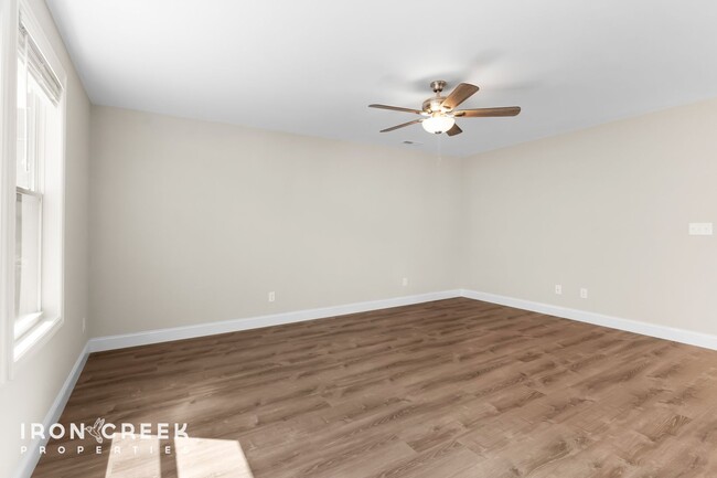 Building Photo - Bright and Modern: New Construction Three-...