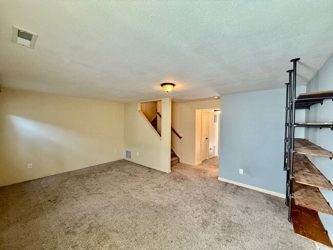 Building Photo - Spacious 4-Bedroom Home on Half an Acre in...