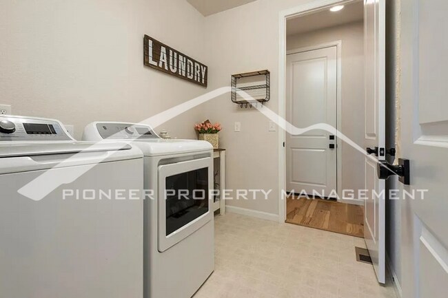 Building Photo - Stylish Main-Level Living with Finished Ba...