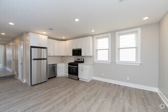Building Photo - Beautiful Gut Renovated 2 Bed/1 Bath 2nd F...