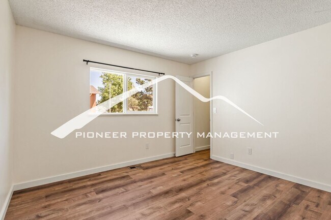 Building Photo - Updated 4 Bed, 2 Bath Home in Briargate with Mountain Views, fully fenced yard, 2 car garage and AC