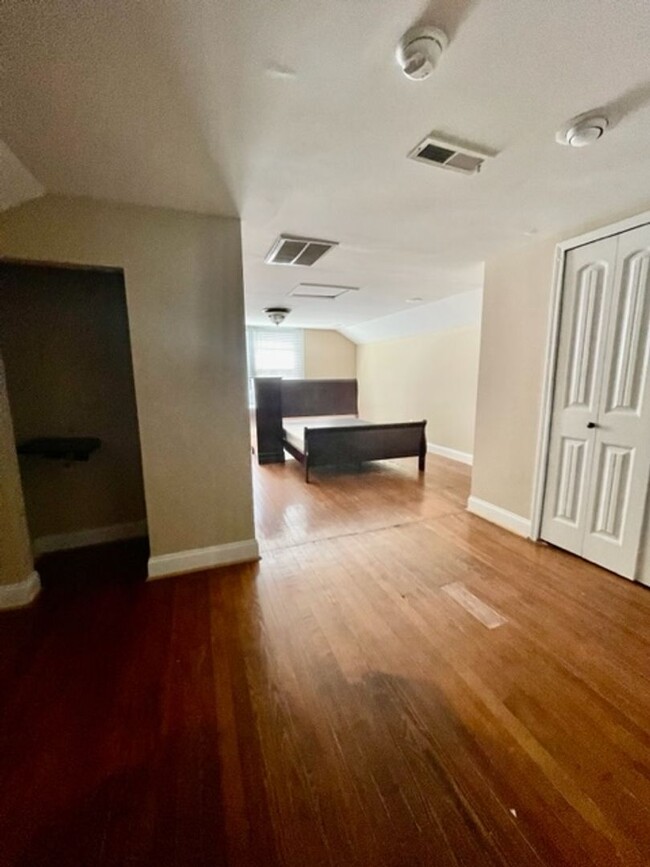 Building Photo - Introducing WesleyHeights401, a charming 3...