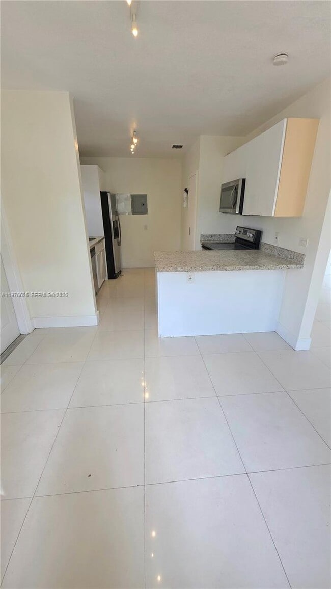 Building Photo - 5715 NW 6th Ave