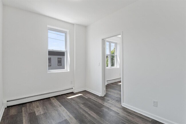 Building Photo - 310 Paterson Plank Rd