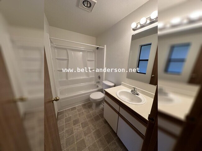 Building Photo - MOVE IN READY- Remodeled 2-bedroom Townhome!