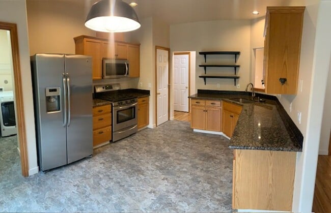 Building Photo - $3,300 - Two-Story Home with Three Bedrooms, 2.5 Bathrooms, and a Bonus Room