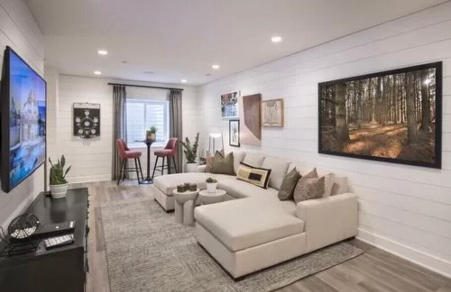 Model house reference photo for furnished basement - 609 Brewster Aly