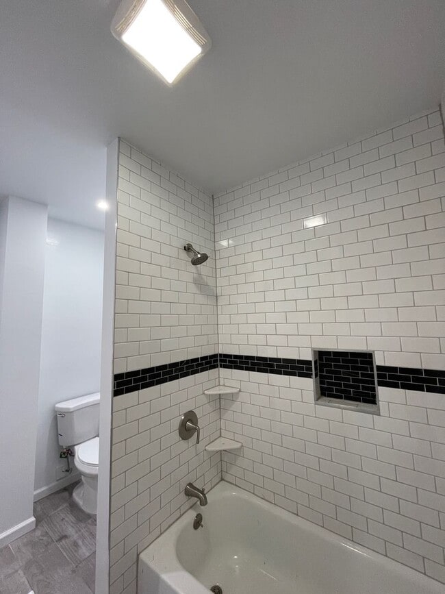 Building Photo - Updated 3 Bedroom House With a backyard and Laundry