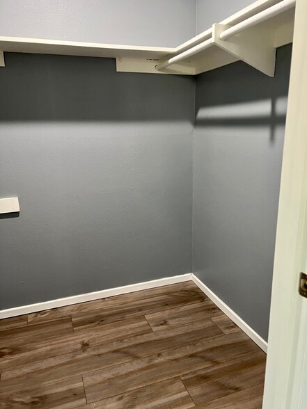 Walk in closet in master bedroom. - 5710 Baltimore Dr