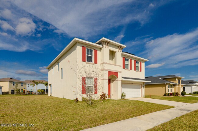 Building Photo - 10976 SW Tessili Wy