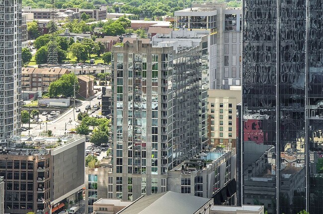 Building Photo - Stunning condo in the heart of SoBro at the Encore! Beautiful 1 bed, 1 bath on the amenity floor ...