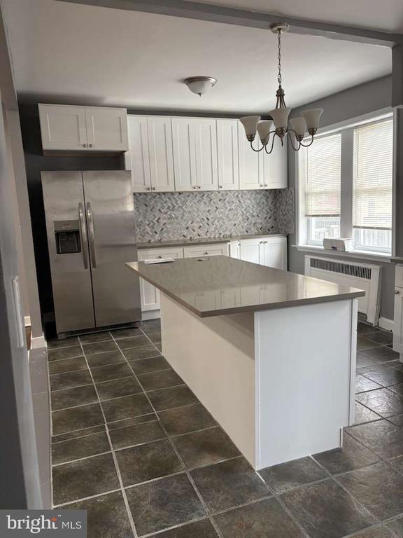 Building Photo - 5718 Woodbine Ave