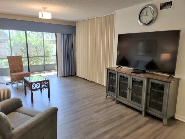 Building Photo - Bird Bay Village Annual Rental – Furnished 1st Floor Unit with Covered Parking