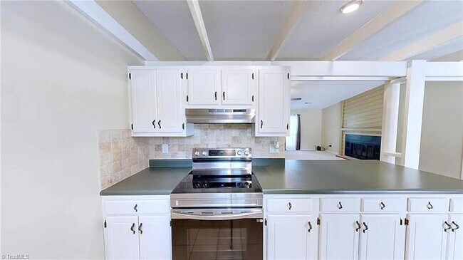 Building Photo - Earn Wealth While Leasing - Like a Homeown...