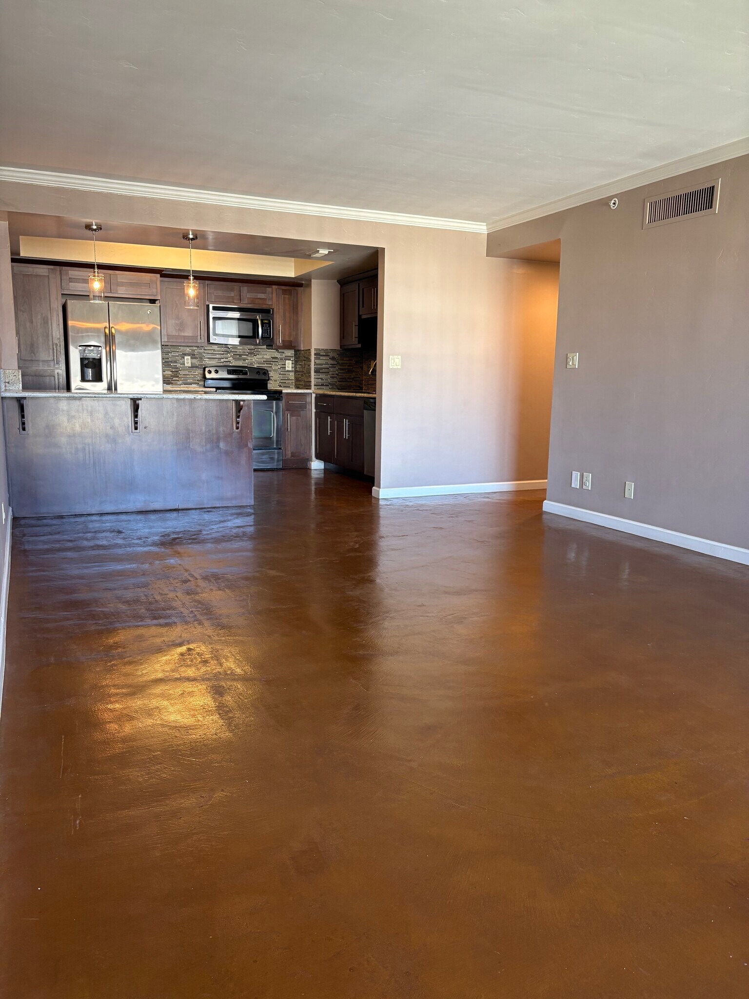 Livingroom includes wall-wall, floor-ceiling windows, balcony access and outlet on wall for TV - 500 N St