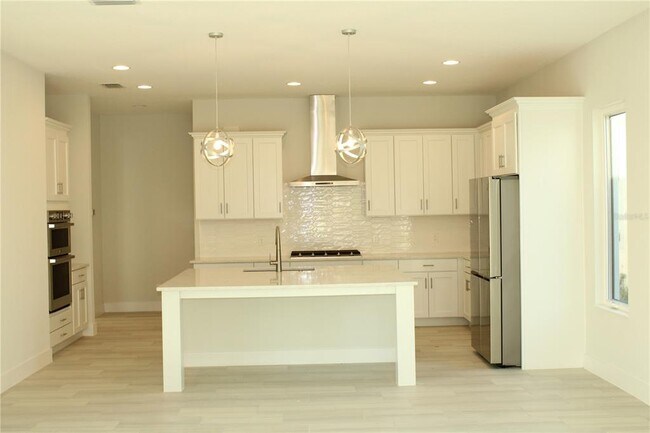 Building Photo - 6311 Pigeon Plum Way