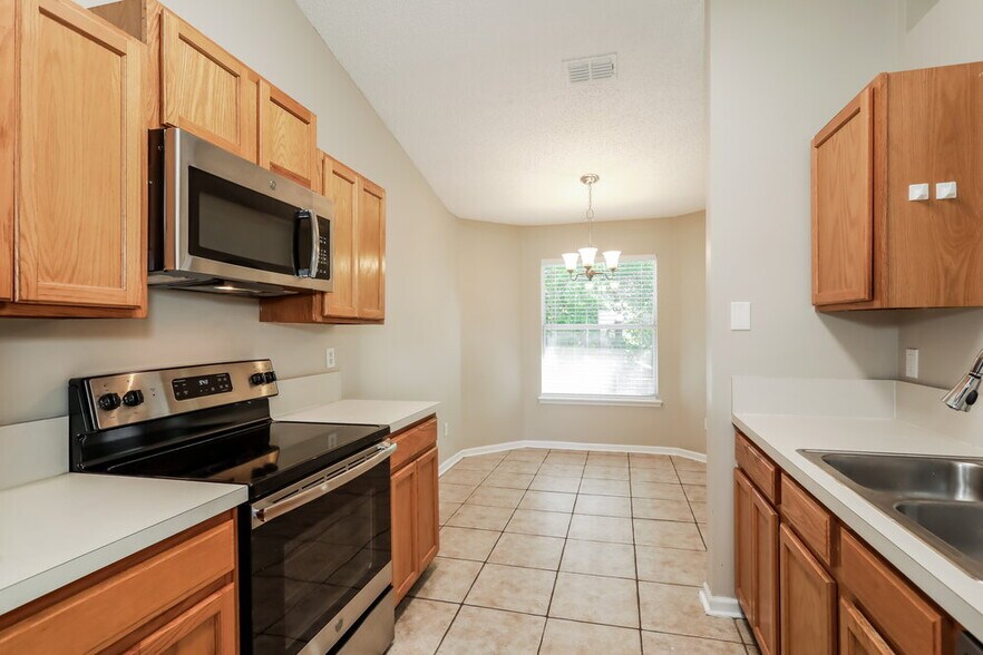 Building Photo - 7811 Invermere Blvd N