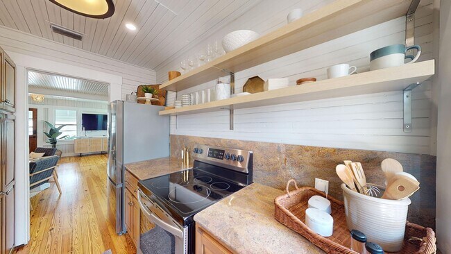 Building Photo - Presenting a meticulously renovated and fu...