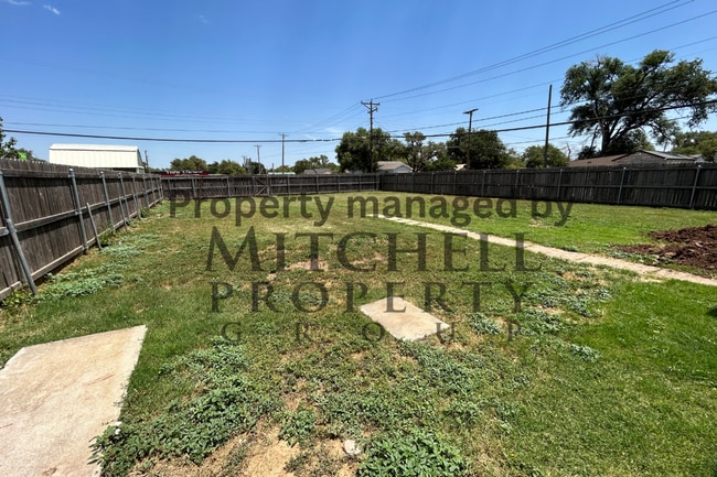Building Photo - Welcom to 4017 S. Hughes! 2 bedroom with a...