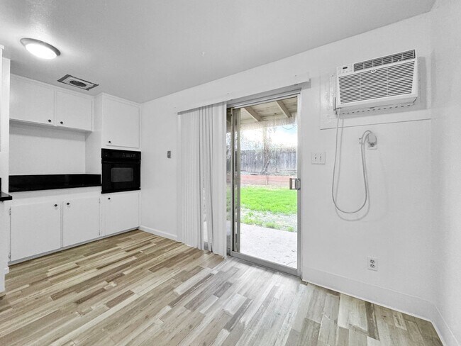 Building Photo - 2BR/1BA House w/ Fenced Yard + Garage In Carmichael