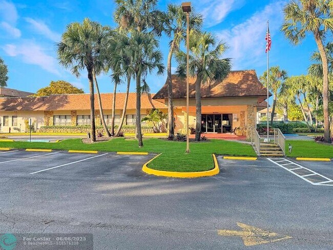 Building Photo - 6090 N Sabal Palm Blvd