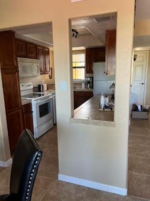 Building Photo - 6651 N Campbell Ave