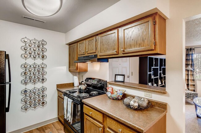 CHARMING KITCHEN WITH BLACK APPLIANCES - Clearview