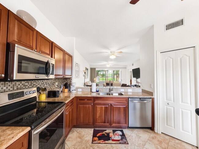 Building Photo - Beautifully furnished 2BR/2BA first-floor condo