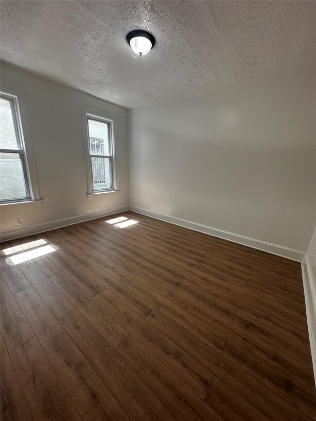 Building Photo - 26-33 96th St
