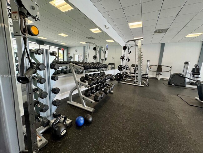 Building Photo - 3675 N Country Club Dr