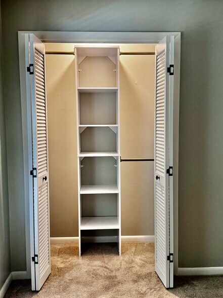 Guest closet. New shelving/rods. - 122 Turnwood Ln