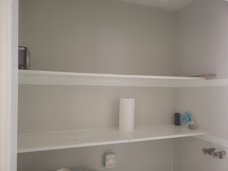 Half bath storage above laundry - 1043 S Trenton Ave