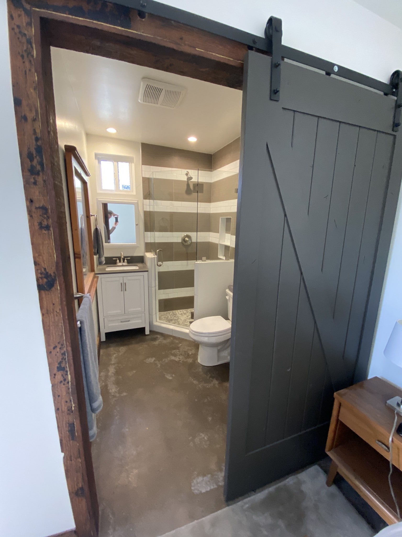 bathroom behind sliding barn door door - 2258 Overland Ave