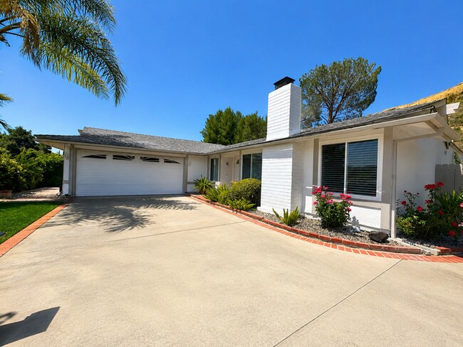 Building Photo - Welcome to this beautifully updated 4-bedroom, 2-bathroom home nestled on a private flag lot in t...