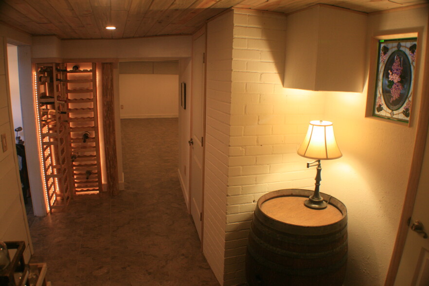 Wine cellar and view into one game room - 630 Columbia St