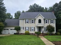 Building Photo - 402 E Raintree Ln