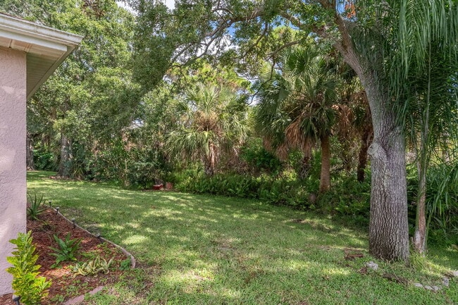 Building Photo - Spacious 3/2 with tranquil setting is waiting for you!