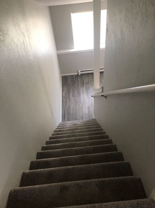 Building Photo - TWO-STORY CONDO IN RIFLE!