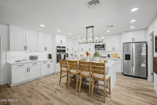 Building Photo - 5140 E Poinsettia Dr