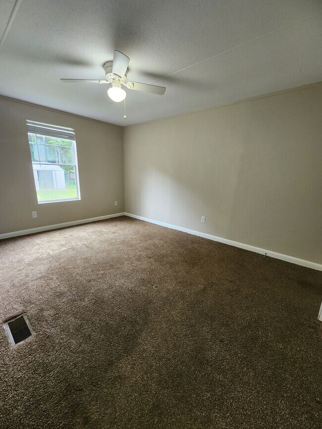 Building Photo - 3 bed, 2 bath w/ Front & Back Decks, 1/4 Acre of land, FENCED backyard