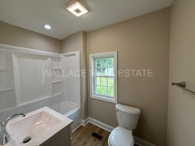 Building Photo - TOTALLY RENOVATED 3 BEDROOM HOUSE MINUTES FROM NEW SMOKIES STADIUM!!