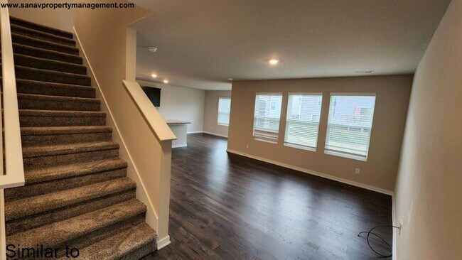 Building Photo - "Modern Luxury: Spacious 4-Bedroom Home with Open-Concept Design"