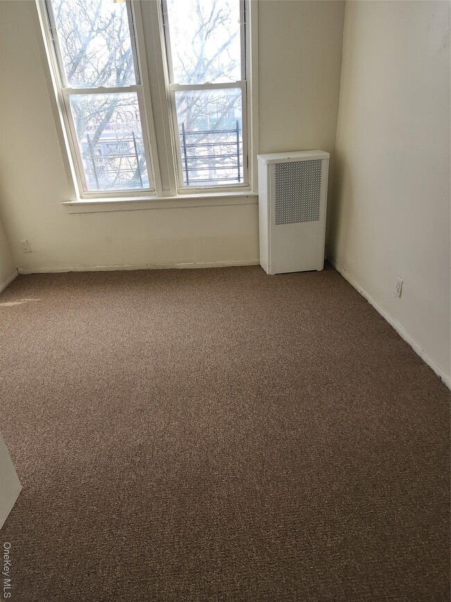 Building Photo - 205-11 Hollis Ave