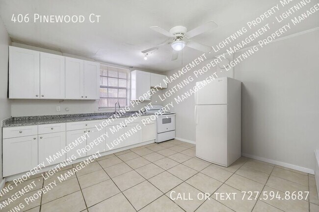 Building Photo - 406 Pinewood Ct