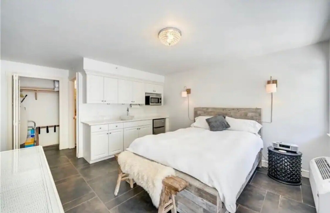 4th bedroom (queen) downstairs by pool - 705 10th St S