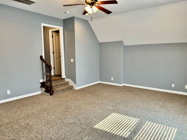 Building Photo - Large Open 4 Bedroom Home with Bonus! Tree Lined Backyard with Privacy Fence!