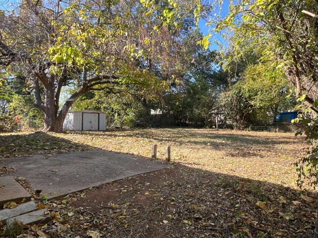 Building Photo - 4-Bedroom Home with Spacious Fenced Yard