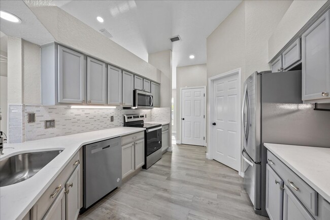 Building Photo - Beautifully remodeled home is situated in ...