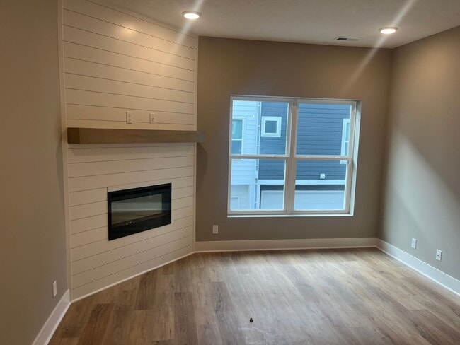 Building Photo - New Construction, 2 bed, 3 bath Row Home, with 2 car garage, fireplace, and rooftop deck!