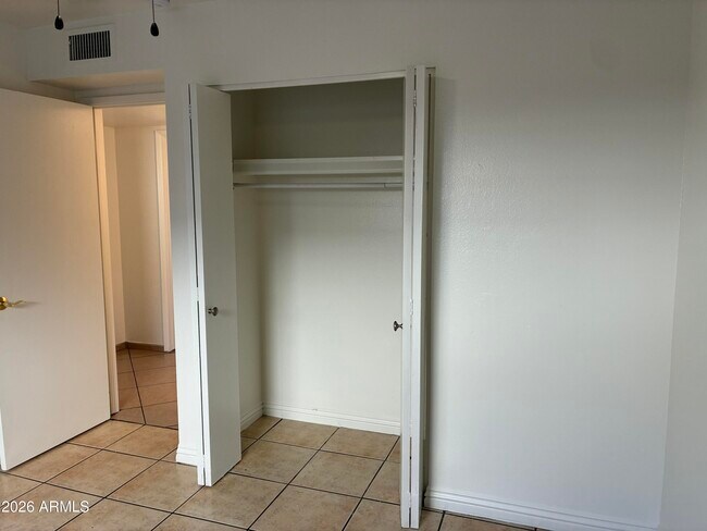 Building Photo - 8819 W Roma Ave